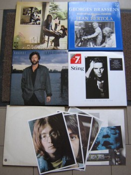 quelques disques doubles, avec le poster et photos sur le blanc, le tout 5eu